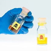 colored poisonous liquid in three different bottles