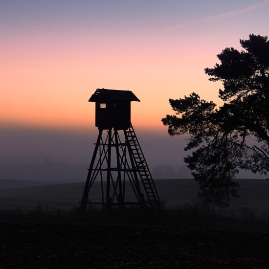 silhouette-of-a-hunting-tower-at-dawn-2